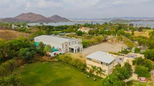 an aerial view of a large house with a large yard at Virasat-1969 in Udaipur