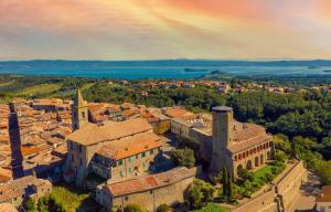 an aerial view of a town with a castle at Silent Lake View in Valentano