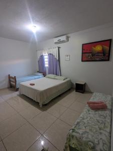Foto de Quarto privado com Banheiro Lauany Pousada
