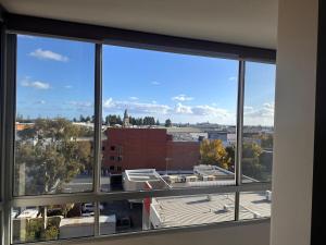 a view of a city from an office window at Ekaya in Fremantle