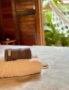 a brown brush sitting on top of a table at Pousadinha in Ilha do Mel