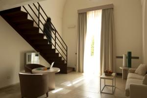 Гостиная зона в Relais Histò San Pietro Sul Mar Piccolo