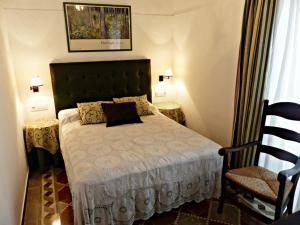 Кровать или кровати в номере Casa Rural los dos Patios
