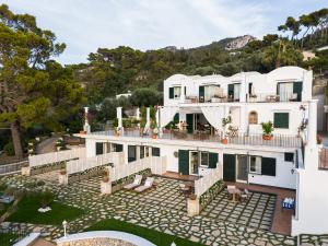 an aerial view of a large white house at Amira Capri in Anacapri