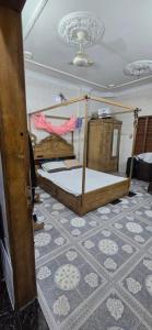 a bedroom with two bunk beds in a room at Shanti villa in Kadipur