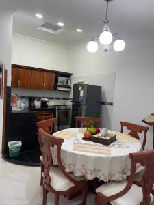 a kitchen with a table with fruit on it at Casa Roldanillo in Roldanillo