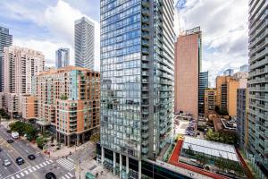 an aerial view of a city with tall buildings at Adelaide Stays and Suites - Walk to Subway - Easy Access Downtown Toronto in Vaughan