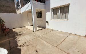 an empty patio in front of a building at Depto Diucon Centro in Esquel
