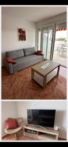 a living room with a couch and a coffee table at Penismar Azul in Peniscola