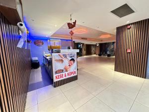 a lobby with a sign that reads keep a monkey at City One Hotel in Kayseri +26 photos