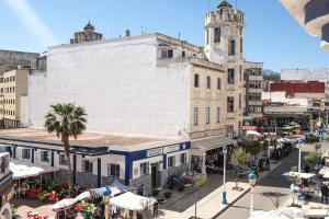 an overhead view of a city street with a building at Hotel Fnidaq in Fnidek
