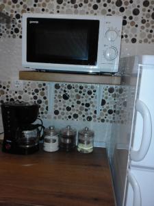 Kuchyň nebo kuchyňský kout v ubytování Apartment Moonlight