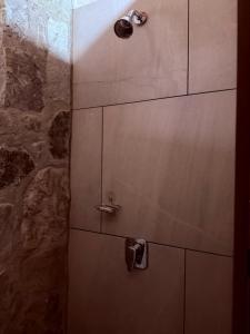 a cabinet with two handles in a bathroom at Royal Fest By GEstores in Huasca de Ocampo +35 photos