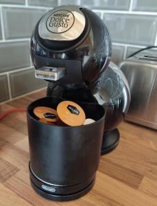 a coffee maker sitting on top of a counter at Woodmount Cottage in Ennistymon