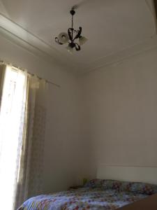 Łóżko lub łóżka w pokoju w obiekcie Antica Sartoria