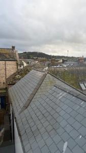 a group of roofs on top of a building at The Teign Rooms in Teignmouth