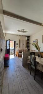 a large living room with a table and a couch at Panoramic House - Midelt Family Triplexe in Midelt +13 photos