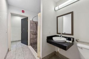 a bathroom with a sink and a mirror at Motel 6-Gastonia Charlotte I-85 in Gastonia +29 photos
