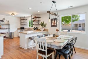 a kitchen and dining room with a table and chairs at Boots and Barrels Ranch in Paso Robles