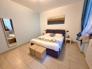 a bedroom with a bed in a room at Belvedere in Costa - Lake View in Bellano