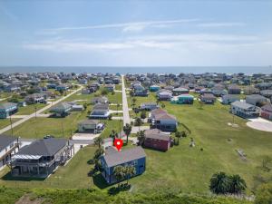 an aerial view of a village with the obelisk at Caribbean Palm Retreat 3BR Near Crystal Beach Fireplace in Bolivar Peninsula
