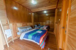 Postel nebo postele na pokoji v ubytování Rice Homestay + 37 fotografií