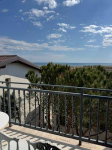 a balcony with a view of the ocean at Flat Ergli in Velipojë