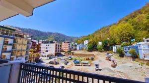 a view from a balcony of a city at Haven On Hill - Rishikesh in Rishīkesh