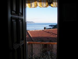 a view of the ocean from a window at Ca'di Gilbi e Pasqui in La Spezia