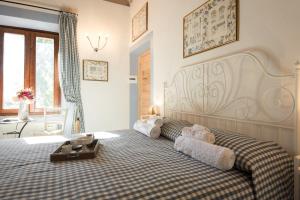 Postel nebo postele na pokoji v ubytování Casa Il Borghetto - Luxury Suites & Pool