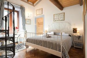 Postel nebo postele na pokoji v ubytování Casa Il Borghetto - Luxury Suites & Pool