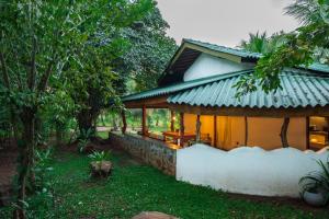 a house in the middle of a garden at Zov Wild Yala in Kataragama +25 photos