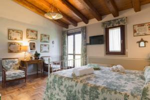 Postel nebo postele na pokoji v ubytování Casa Il Borghetto - Luxury Suites & Pool
