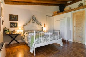 Postel nebo postele na pokoji v ubytování Casa Il Borghetto - Luxury Suites & Pool