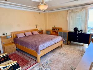 a bedroom with a bed and a large window at Villa Tenerife Sur in Adeje +86 photos