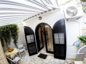 Patio nebo venkovní prostory v ubytování Apartments Villa Mirella