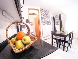 Kuchyň nebo kuchyňský kout v ubytování Apartments Villa Mirella