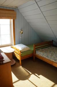 Giường trong phòng chung tại Järve Talu Puhkemaja