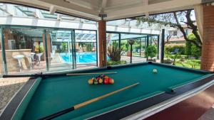 a pool table with balls on top of it at Fontana Wild West in Castelnuovo del Garda +38 photos