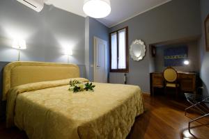 A bed or beds in a room at Da Bruno Homes