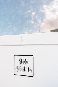 a window with the words shuttle must tie at Studio Albert 1er in Oye-Plage +23 photos