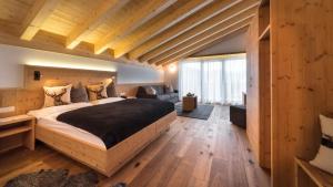 Postel nebo postele na pokoji v ubytování Hotel Moritz
