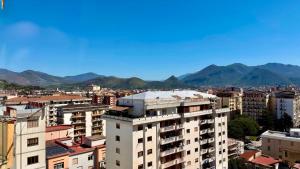 a view of a city with mountains in the background at Susanna's House in Nocera Inferiore