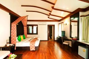 Postel nebo postele na pokoji v ubytování Aonang Phu Petra Resort, Krabi - SHA Plus