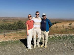 a group of three people standing on top of a hill at Sidi hssain in Marrakesh