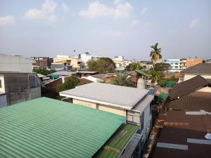 an overhead view of a city with buildings at Doctor Thanut Hostel in Ubon Ratchathani