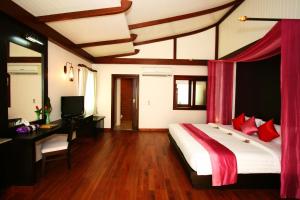 Postel nebo postele na pokoji v ubytování Aonang Phu Petra Resort, Krabi - SHA Plus