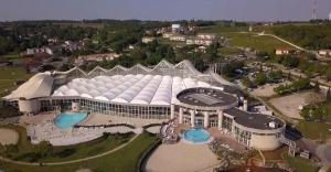 an aerial view of a large white building at Les Logis de la Seugne in Saint-Germain-de-Lusignan