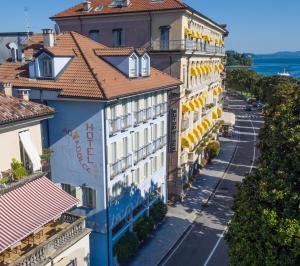 an aerial view of a building in a city at Hotel Aquadolce in Verbania