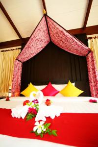 Postel nebo postele na pokoji v ubytování Aonang Phu Petra Resort, Krabi - SHA Plus